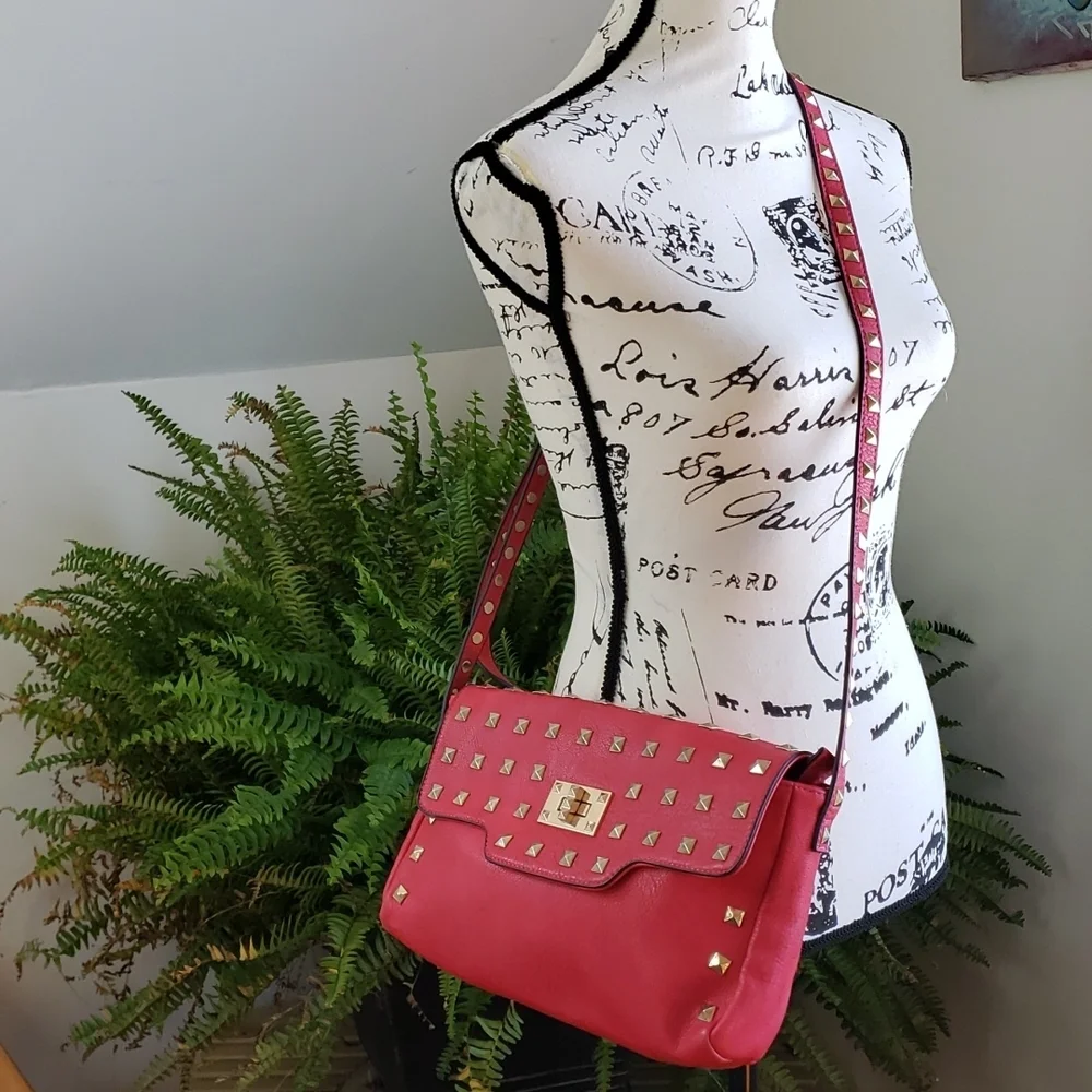 RED studded-embellished lipstick red vegan leather shoulder bag